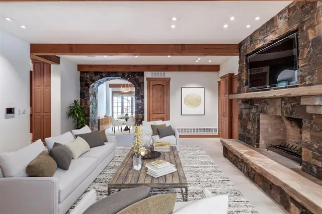 a view of a living room and kitchen