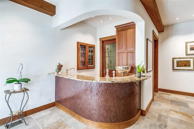 a kitchen with a sink and cabinets