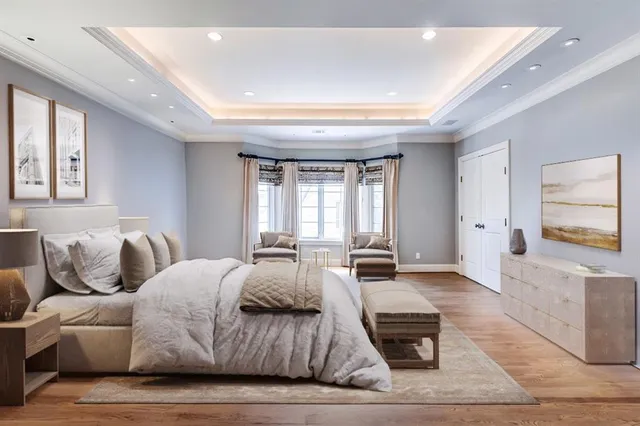 a balcony with chairs and table