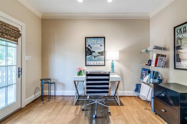 a view of a livingroom with an entryway and an empty room