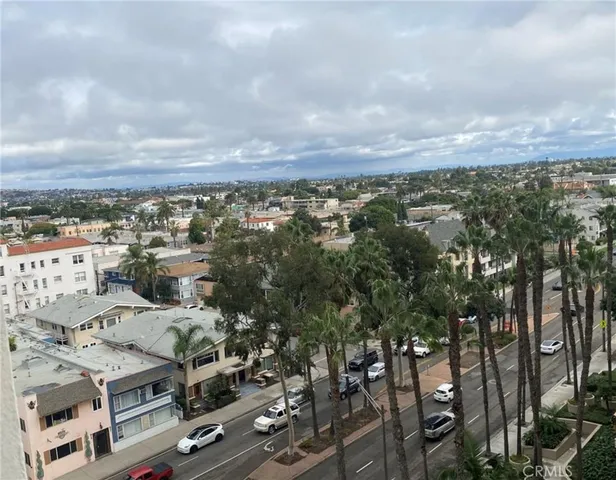 an aerial view of residential building with parking space
