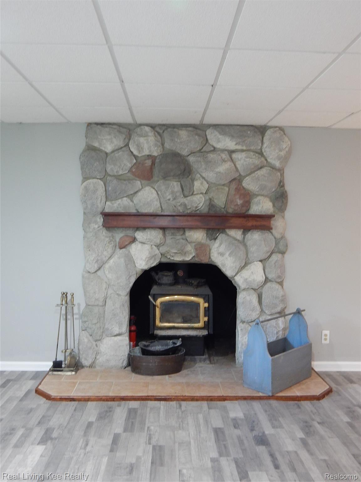 2346 Noble Road Oxford, MI 48370 - Photo 28 of 31 Wood burning stove