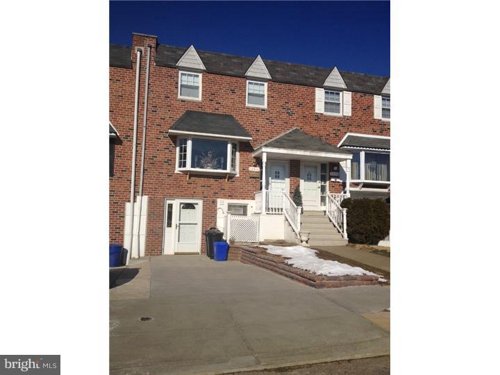 12516 Calpine Road Philadelphia, PA 19154 - Photo 1 of 22 a front view of a house with a yard