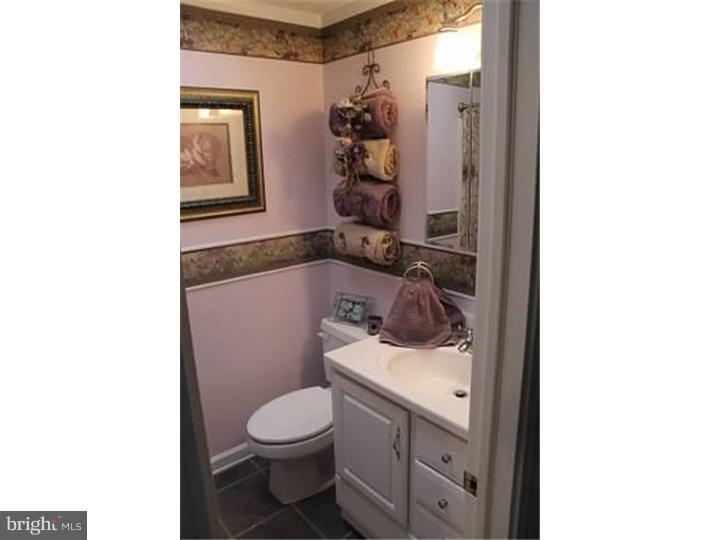 12516 Calpine Road Philadelphia, PA 19154 - Photo 14 of 22 a bathroom with a sink and a toilet