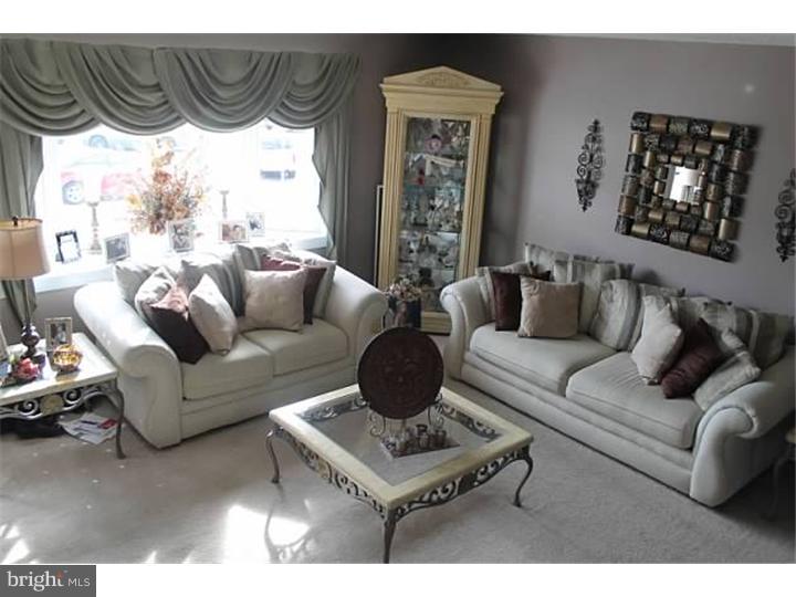 12516 Calpine Road Philadelphia, PA 19154 - Photo 4 of 22 a living room with furniture and a window
