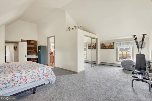 a kitchen with a table chairs and a fireplace
