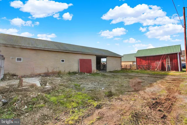 an aerial view of a house with lake view and a ocean view