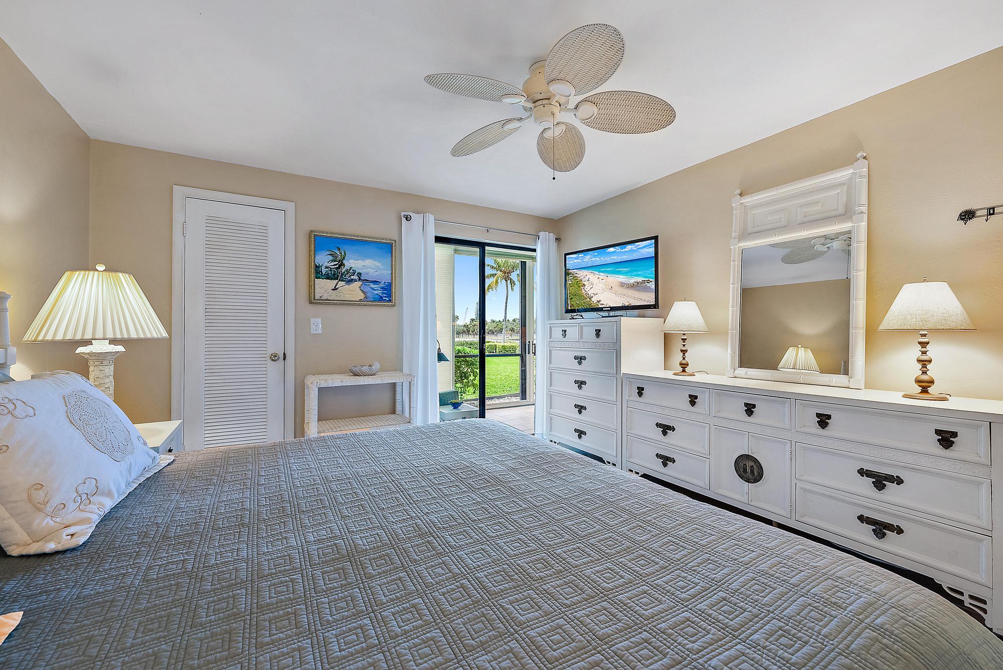 755 Saturn Street, Unit E106 Jupiter, FL 33477 - Photo 11 of 26 Primary Suite