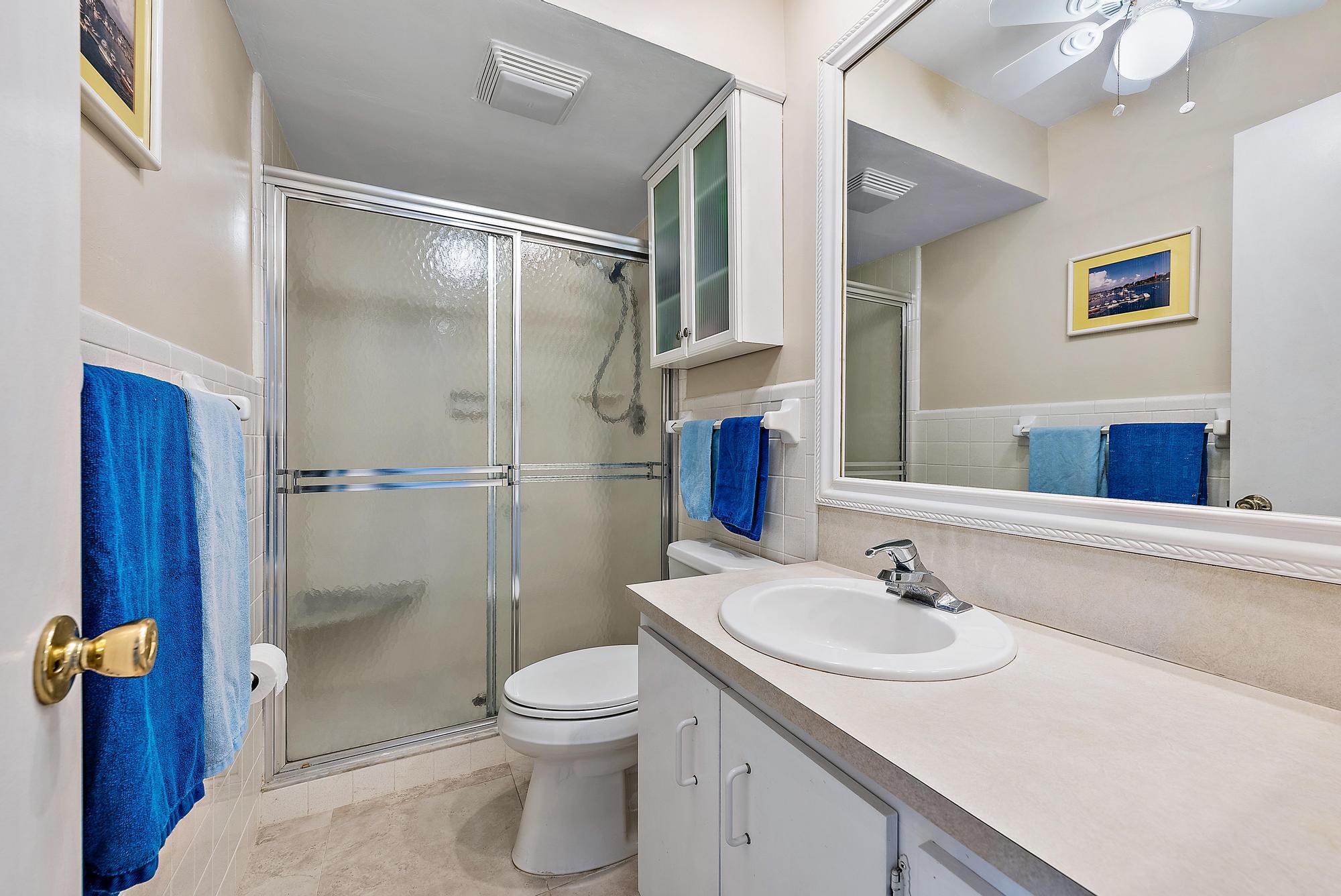 755 Saturn Street, Unit E106 Jupiter, FL 33477 - Photo 13 of 26 Primary Bath
