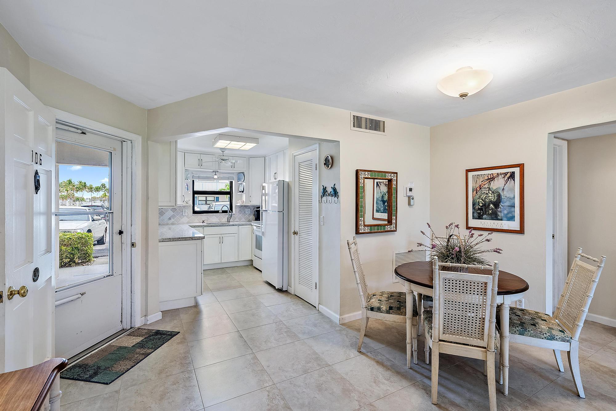 755 Saturn Street, Unit E106 Jupiter, FL 33477 - Photo 17 of 26 Kitchen & Dining