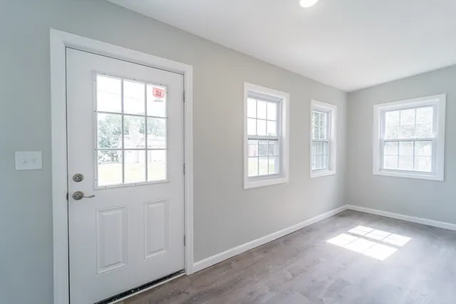 an empty room with windows