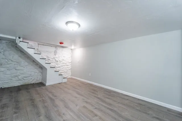 a view of a livingroom with wooden floor