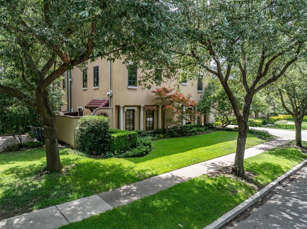 4323 Gilbert Avenue, Unit 4 Dallas, TX 75219 - Photo 3 of 40 a front view of a house with garden