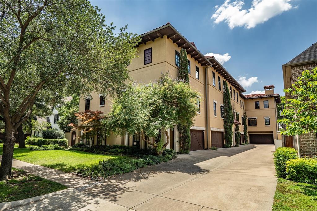 4323 Gilbert Avenue, Unit 4 Dallas, TX 75219 - Photo 5 of 40 a front view of a house with a yard and tree s