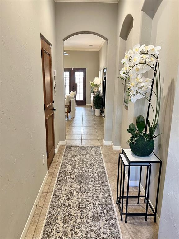4323 Gilbert Avenue, Unit 4 Dallas, TX 75219 - Photo 8 of 40 a view of a hallway to a livingroom and wooden floor