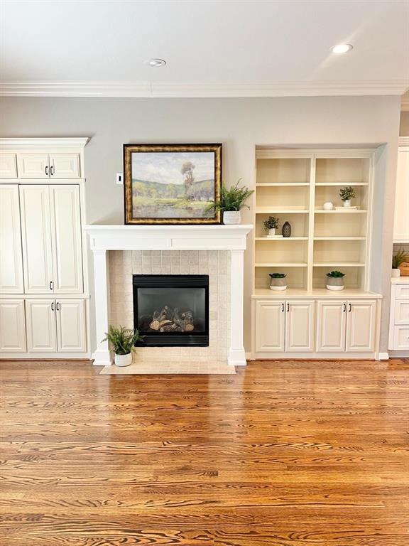 4323 Gilbert Avenue, Unit 4 Dallas, TX 75219 - Photo 10 of 40 a view of a livingroom with an empty space and a fireplace