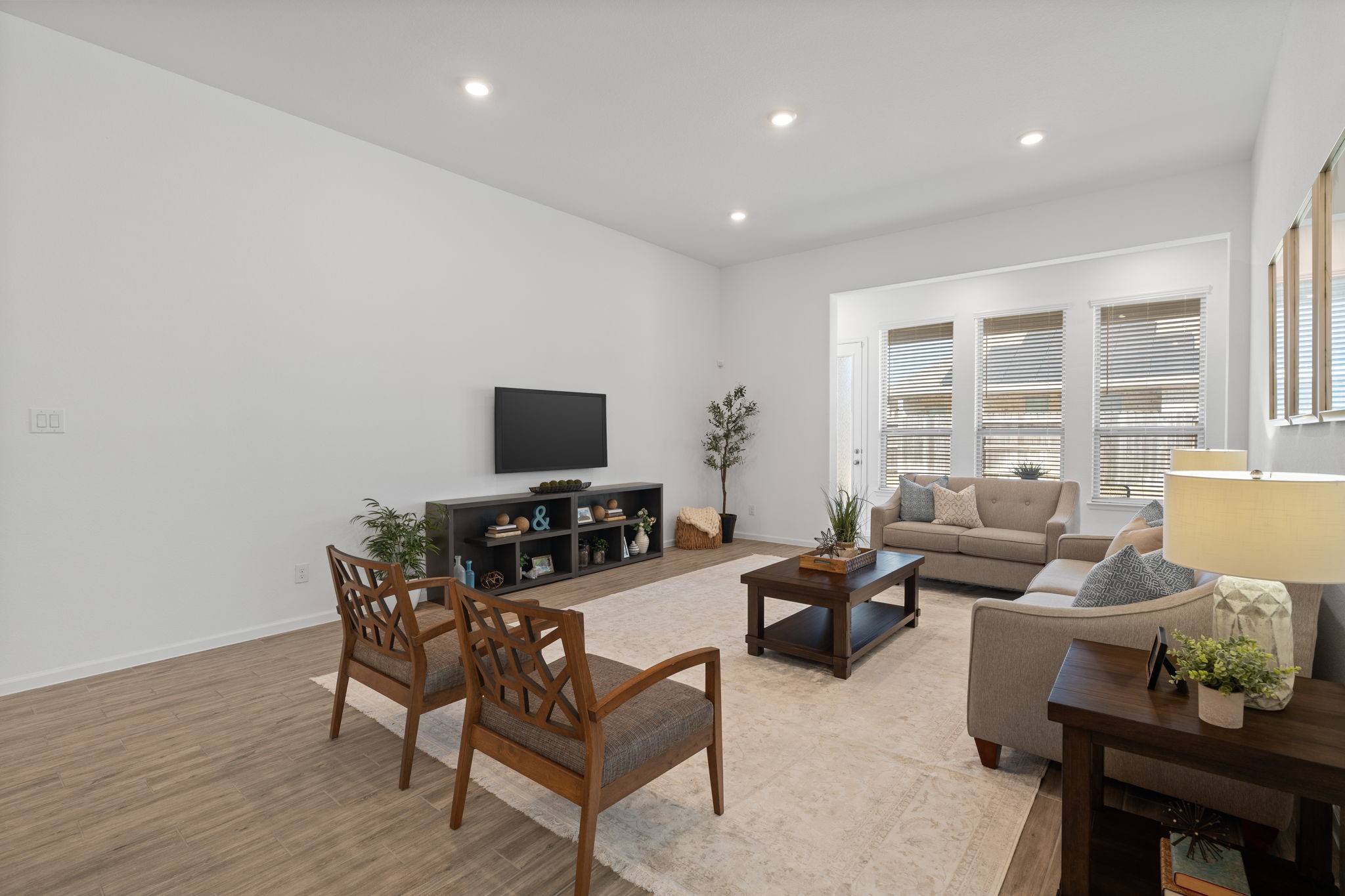 3612 Paloma Fls Lane Rosenberg, TX 77469 - Photo 26 of 49 a living room with furniture and a flat screen tv