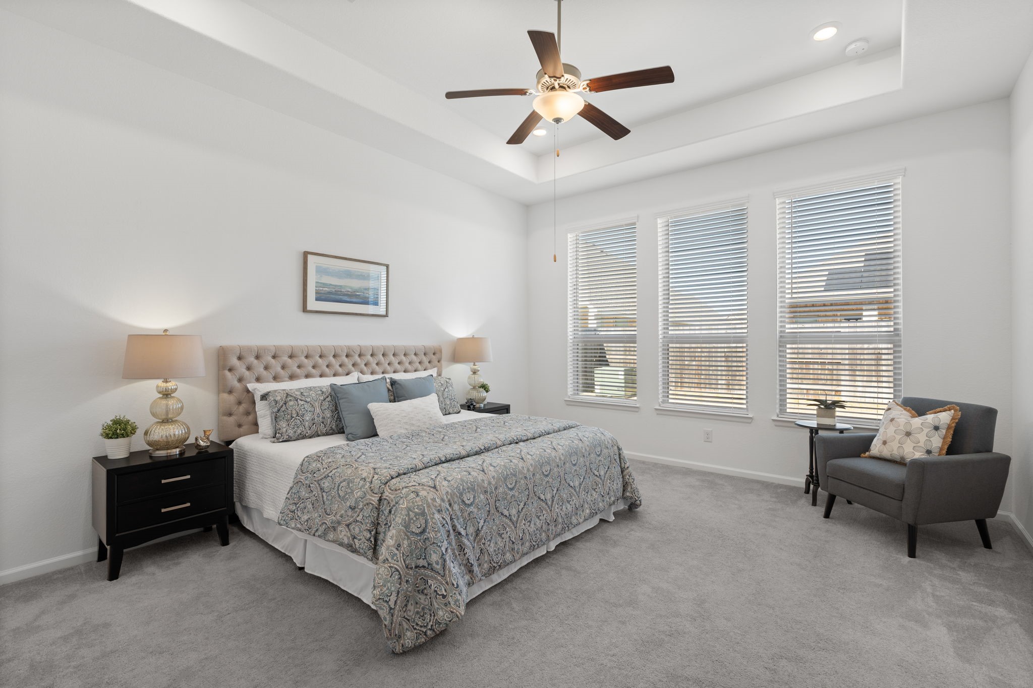 3612 Paloma Fls Lane Rosenberg, TX 77469 - Photo 29 of 49 a spacious bedroom with a bed a couch and a window