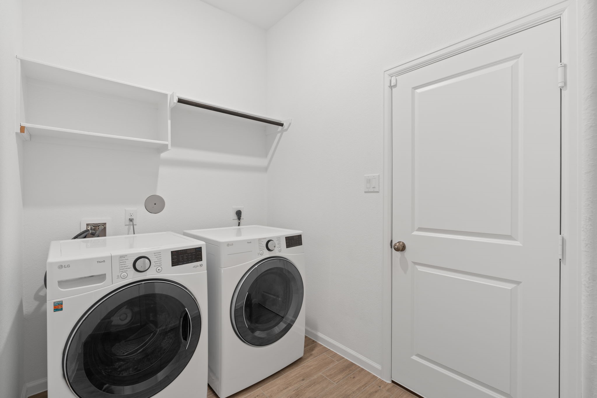 3612 Paloma Fls Lane Rosenberg, TX 77469 - Photo 40 of 49 a view of storage and utility room with washer and dryer