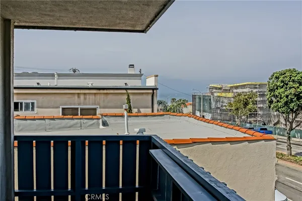 a view of a balcony with an outdoor space