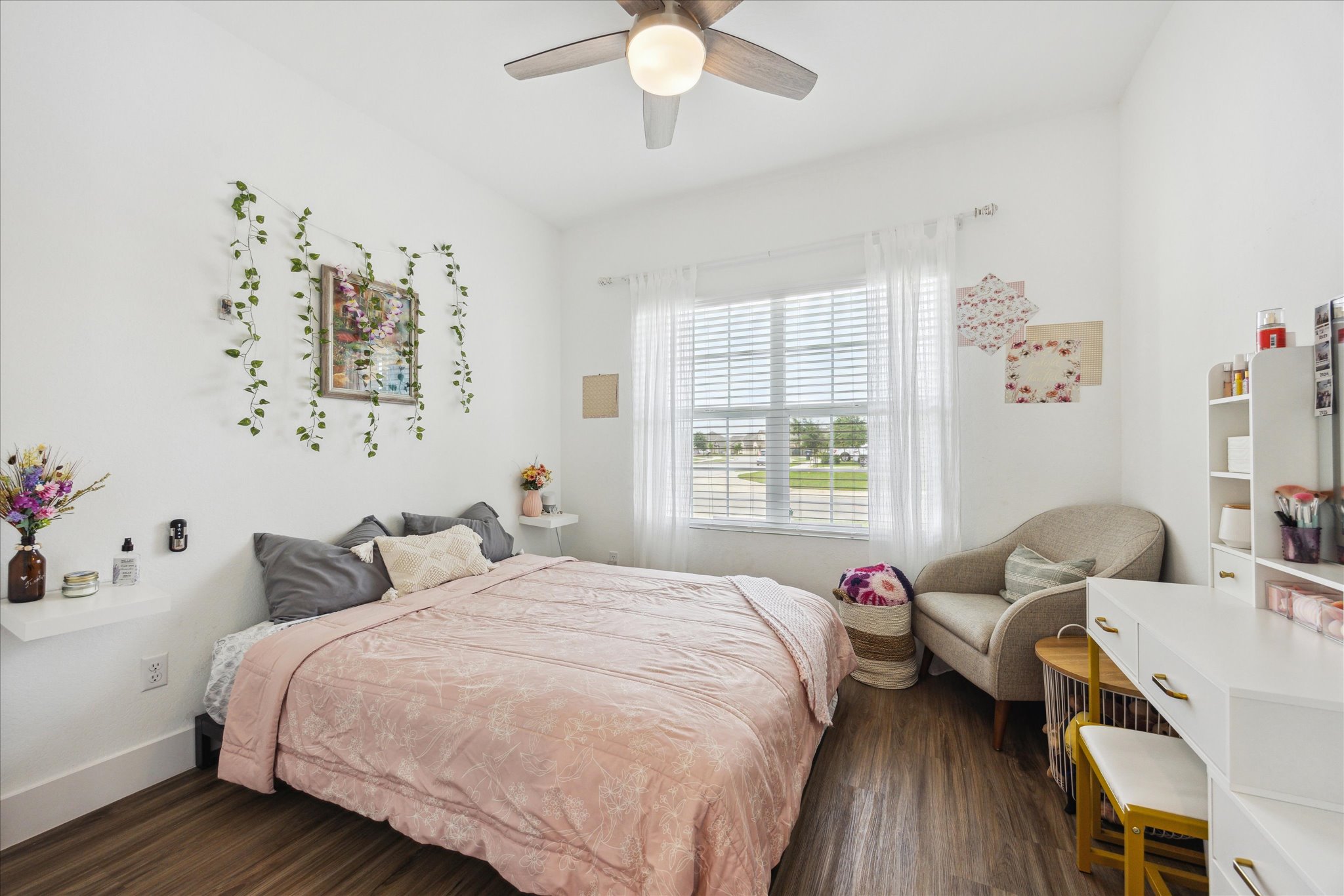 700 Legends Lane Georgetown, TX 78628 - Photo 18 of 31 Bedroom featuring dark wood-style floors, ceiling fan, and baseboards