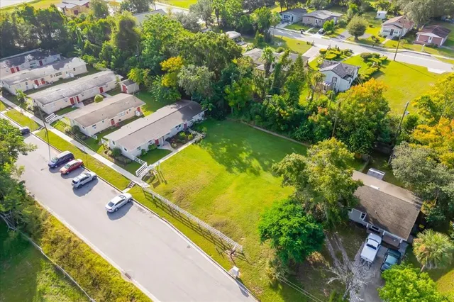an aerial view of a house with swimming pool