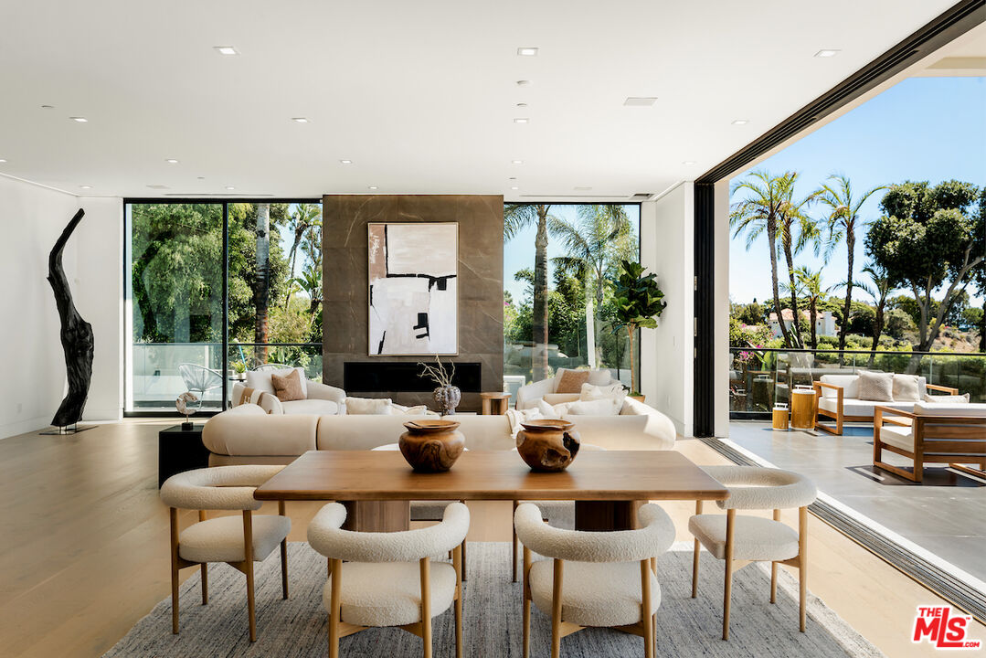 5931 Kanan Dume Road Malibu, CA 90265 - Photo 15 of 53 a view of a dining room with furniture window and outside view