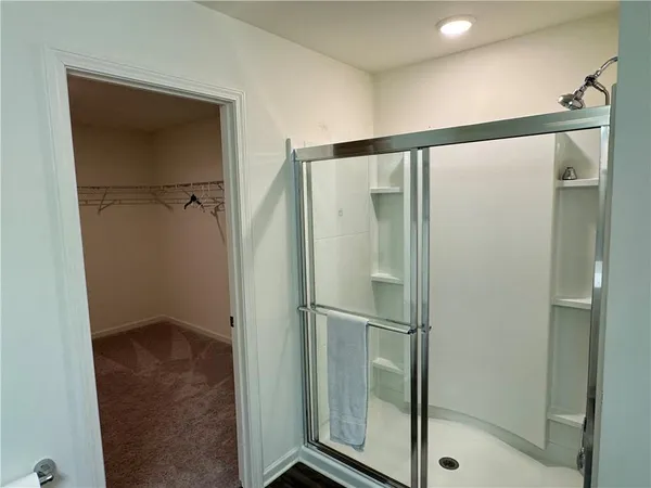a view of a room with racks on the wall