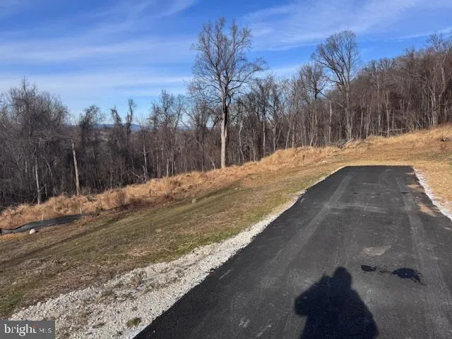a view of a snow on the side of the road