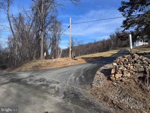 a view of a backyard of the house