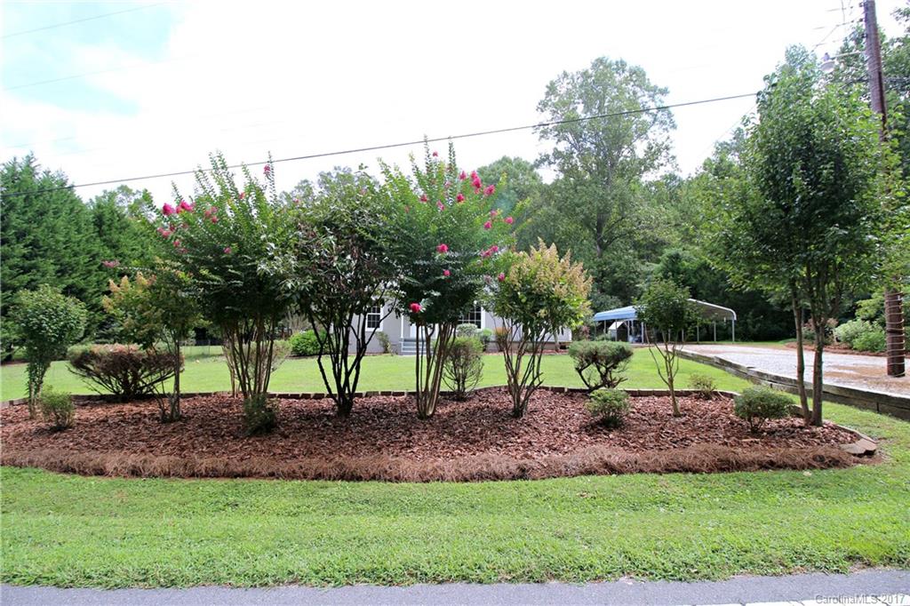1130 Shue Road China Grove, NC 28023 - Photo 2 of 21 a view of house with a backyard