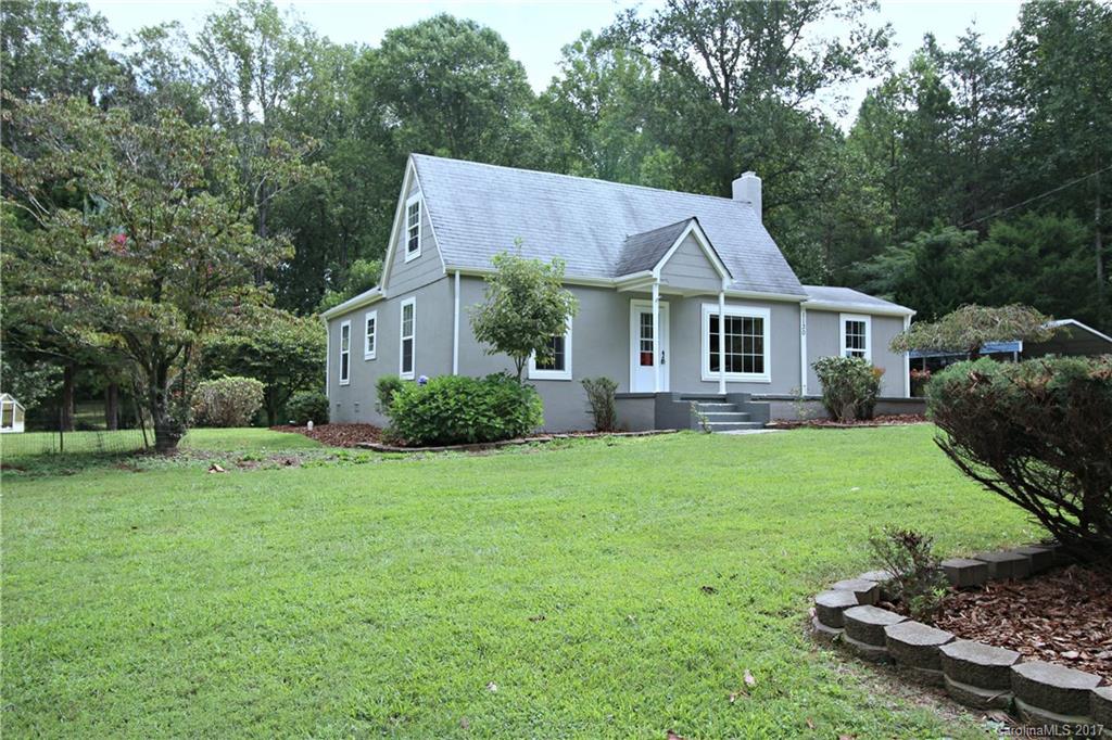 1130 Shue Road China Grove, NC 28023 - Photo 3 of 21 a house that has a lot of plants in it