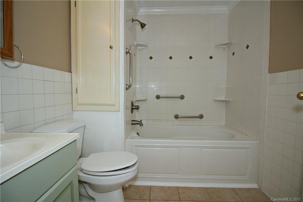 1130 Shue Road China Grove, NC 28023 - Photo 10 of 21 a bathroom with a sink a toilet and shower