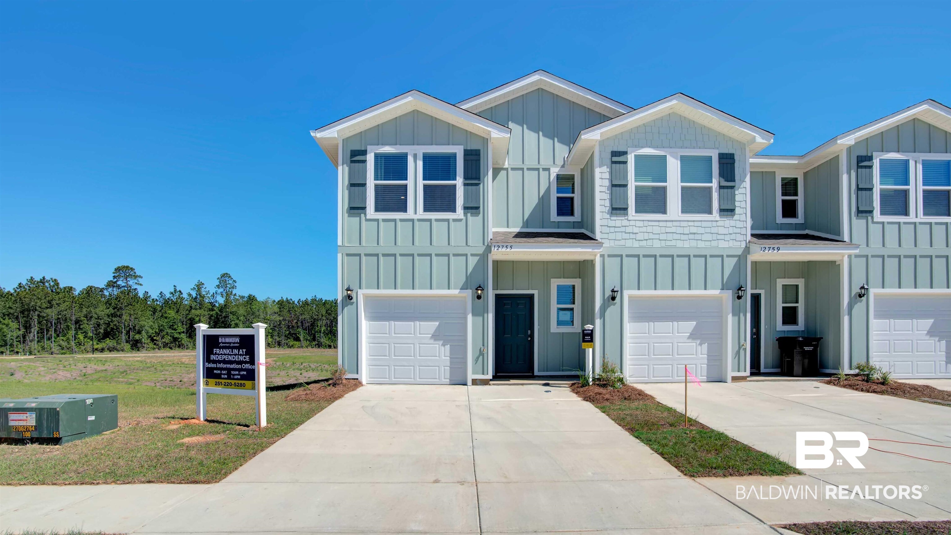12764 Philadelphia Boulevard Daphne, AL 36527 - Photo 1 of 35 View of front of house featuring a front yard and a garage