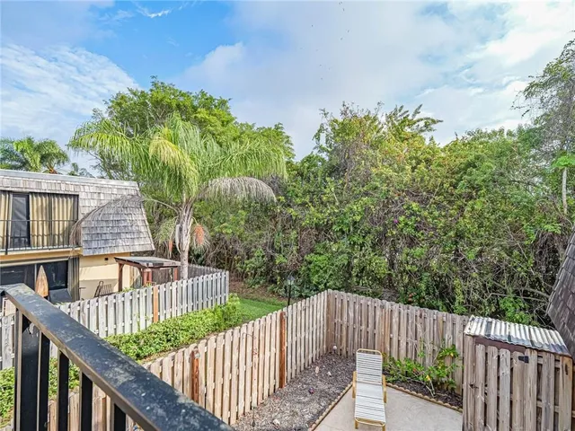 a view of street from balcony