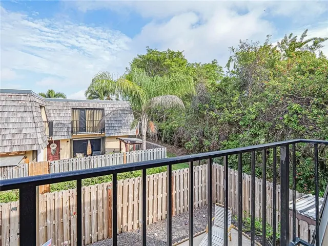 a view of a balcony with lake view
