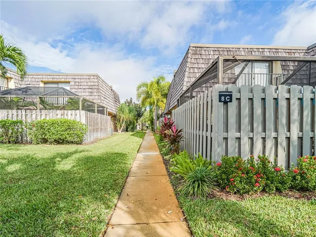 a front view of a house having yard