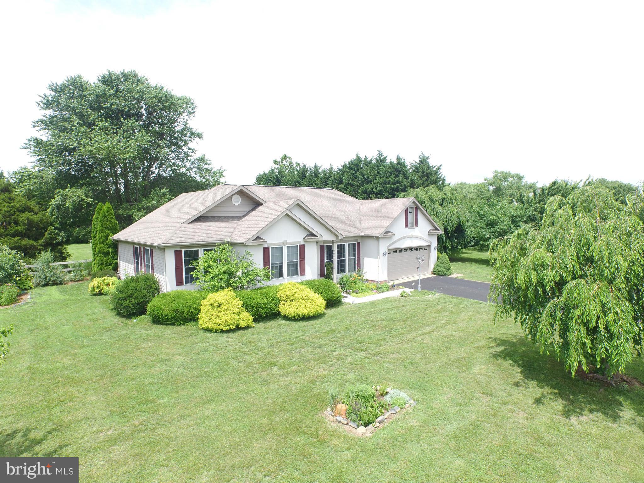 105 Myers Road Chestertown, MD 21620 - Photo 1 of 30 a front view of a house with garden