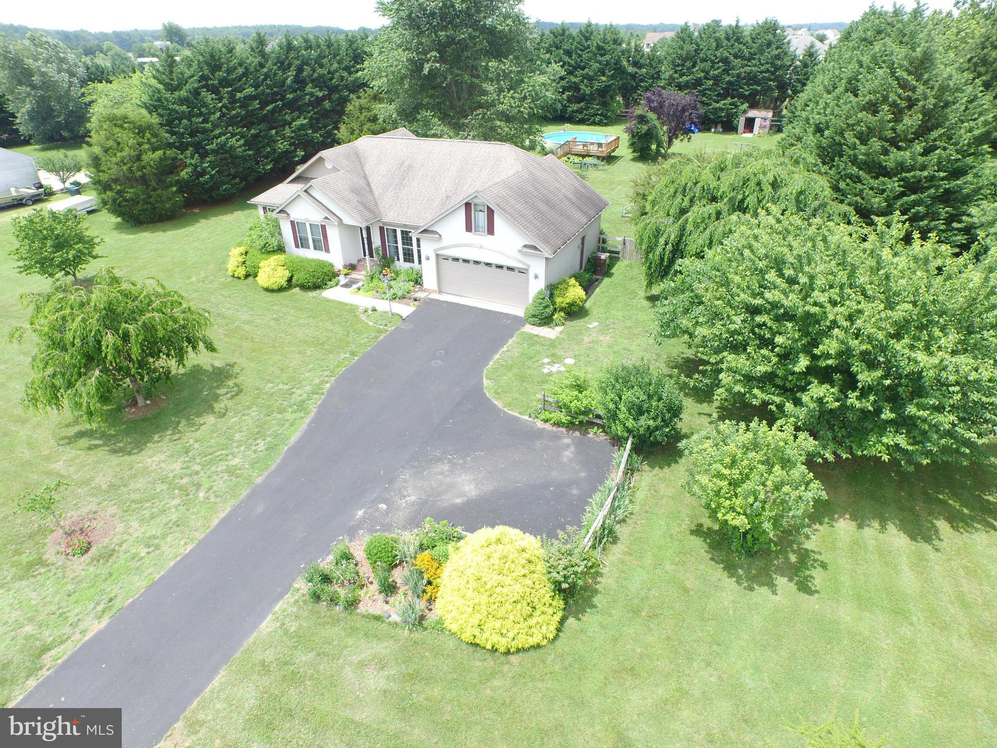 105 Myers Road Chestertown, MD 21620 - Photo 2 of 30 a view of a garden with an outdoor space