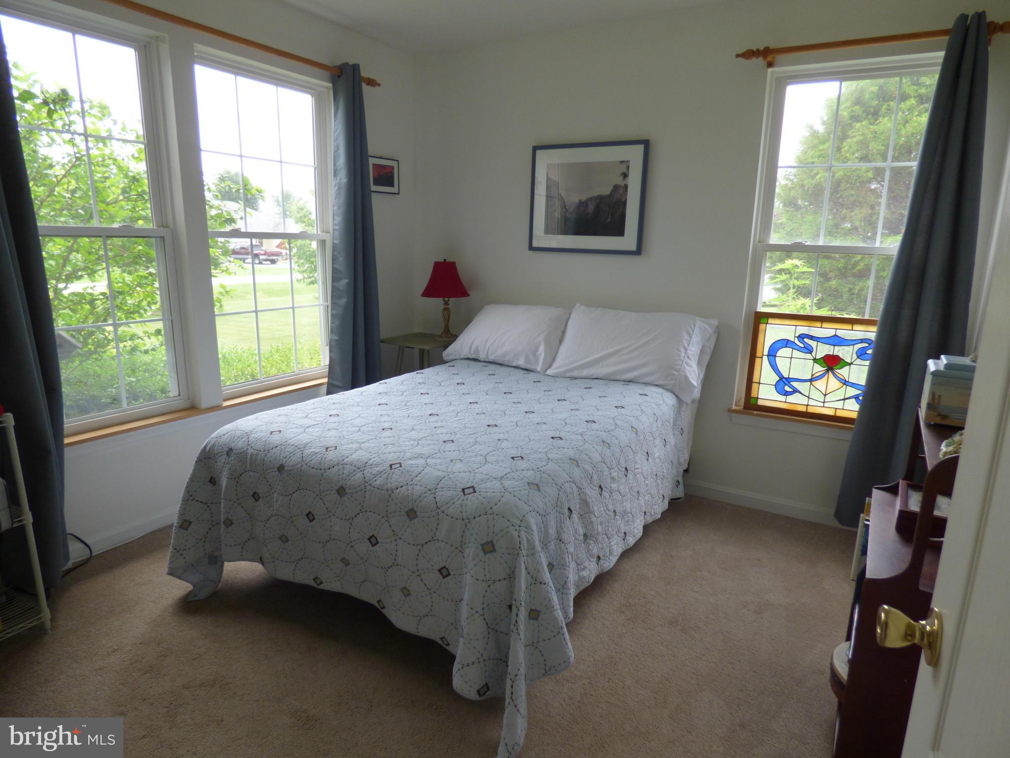105 Myers Road Chestertown, MD 21620 - Photo 19 of 30 a bedroom with a bed and a window