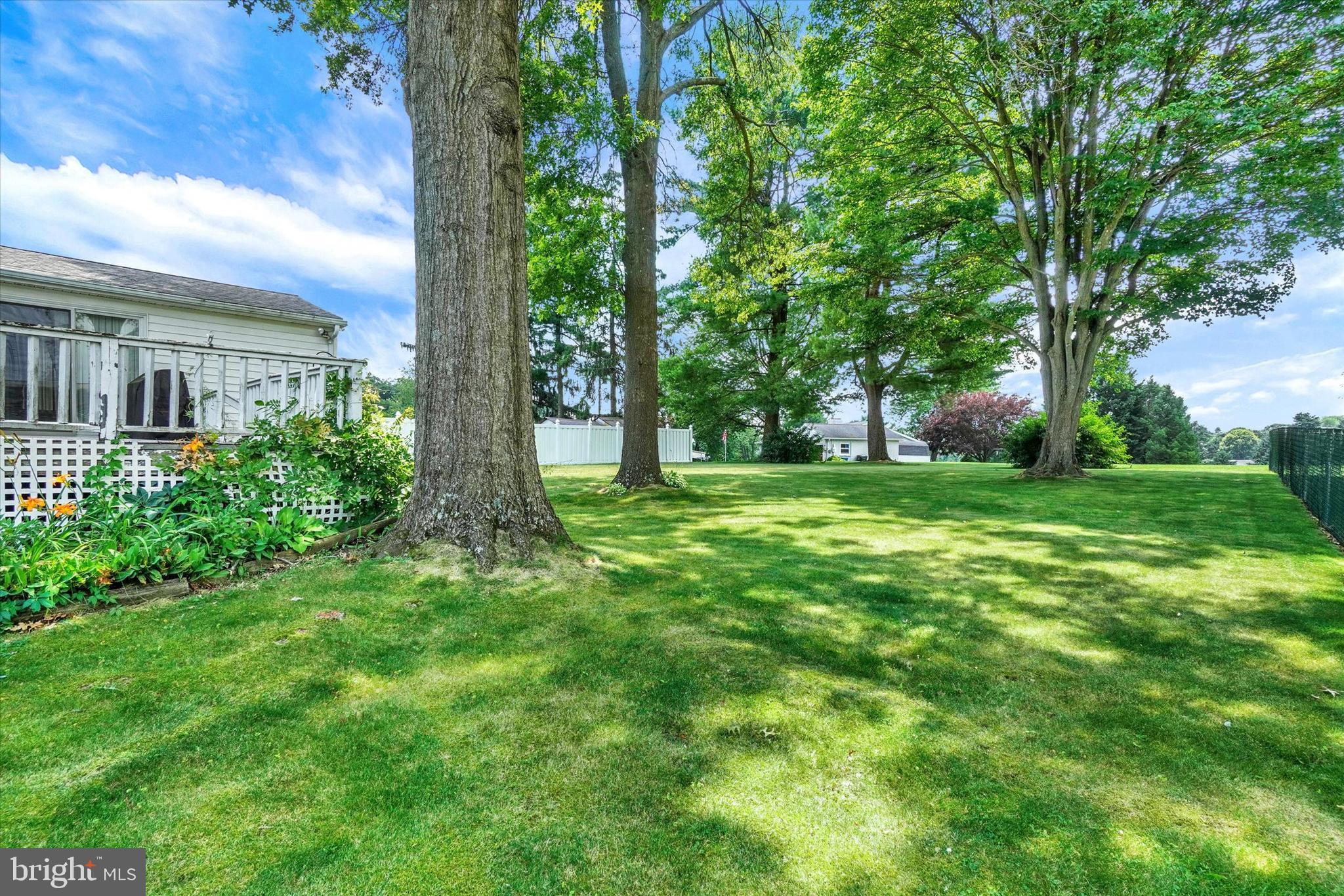 16 Forest Hills Road Red Lion, PA 17356 - Photo 24 of 28 a view of a big yard with plants and large trees