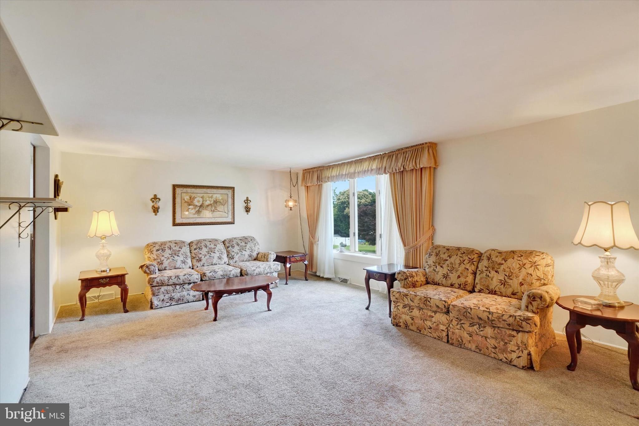 16 Forest Hills Road Red Lion, PA 17356 - Photo 4 of 28 a living room with furniture and a large window