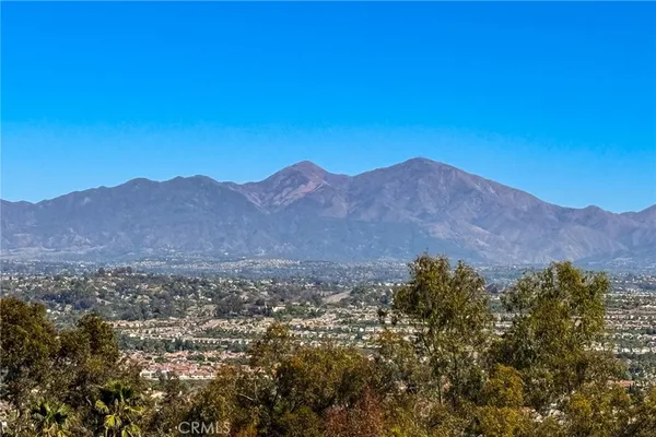a view of mountains and valleys