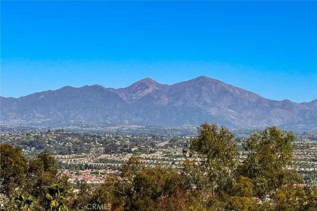 a view of mountains and valleys