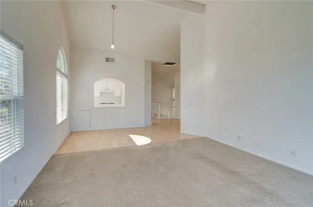 an empty room with windows