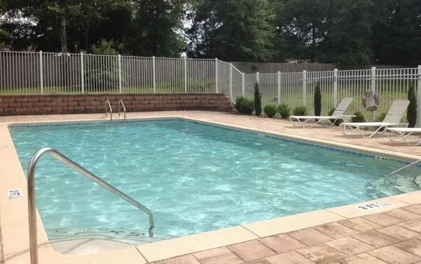 a view of a backyard with a small cabin