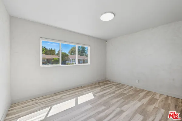 a view of empty room with window