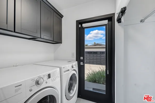 a bathroom with a toilet sink and shower