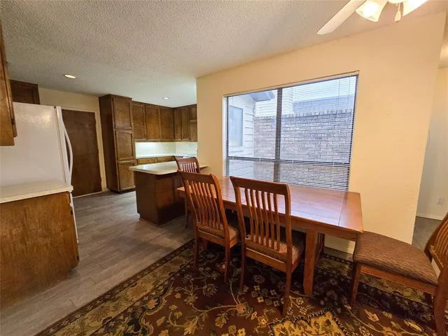 a view of a sitting area with furniture and window