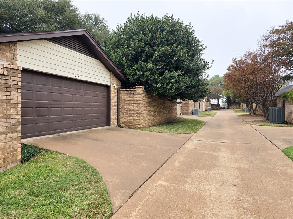 2215 Winter Sunday Way Arlington, TX 76012 - Photo 29 of 29 Alley way to rear entry garage